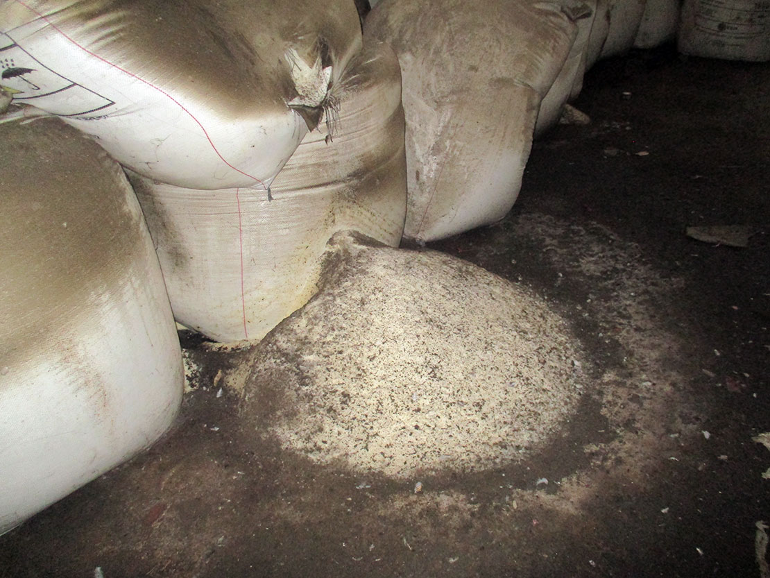Piled bags inside the warehouse
